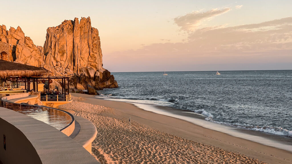 Sunset at Infinity Pool and beach in Cabo San Lucas Mexico